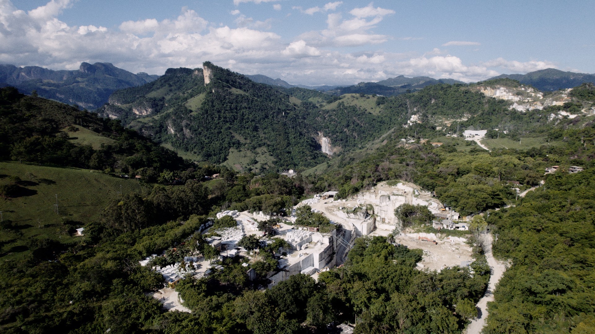 Anders brand wordmark in white placed on top of an image of a modern interior design.
